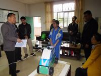 惠州市惠阳区科协深入学校指导全省青少年科技创新大赛参赛项目改良工作