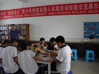 梅州市举办“馆校结合”青少年创意机器人实践活动经验交流展示会